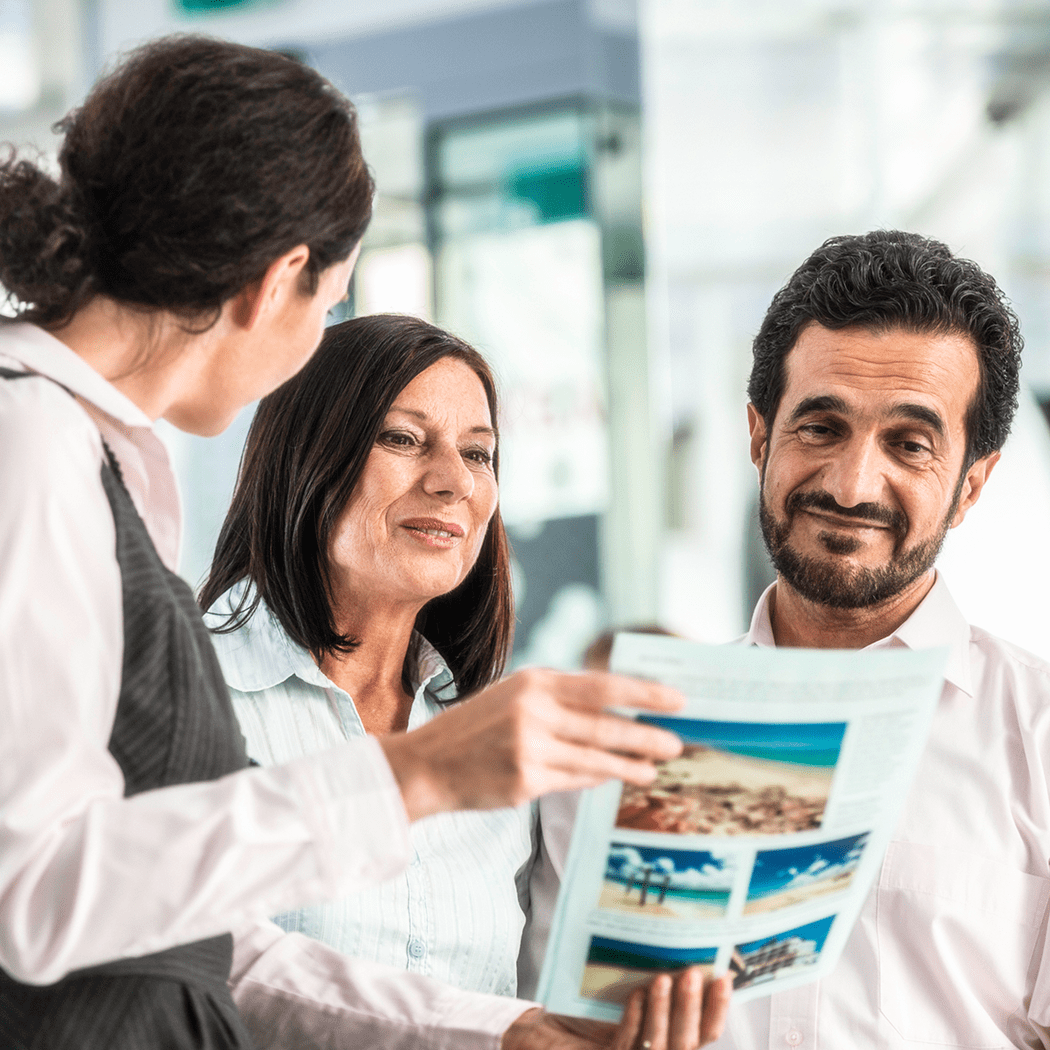 Colleagues looking at travel options